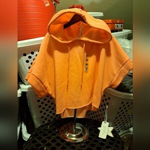 Salmon short sleeved, cropped hoodie.